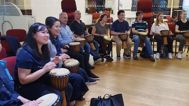 drumming team building in Sydney with NSW Treasury